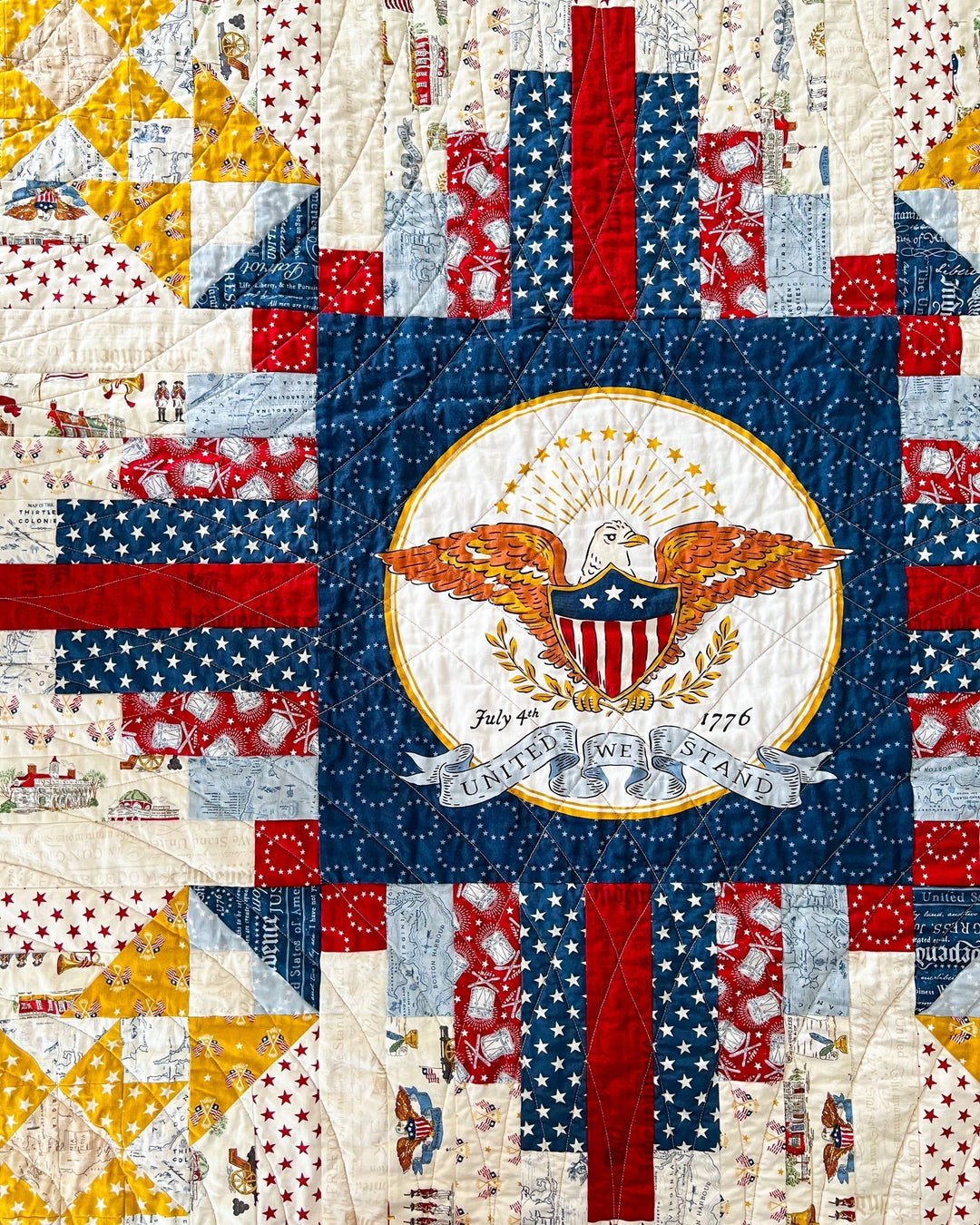 Converging Paths Quilt with American flag design featuring an eagle emblem