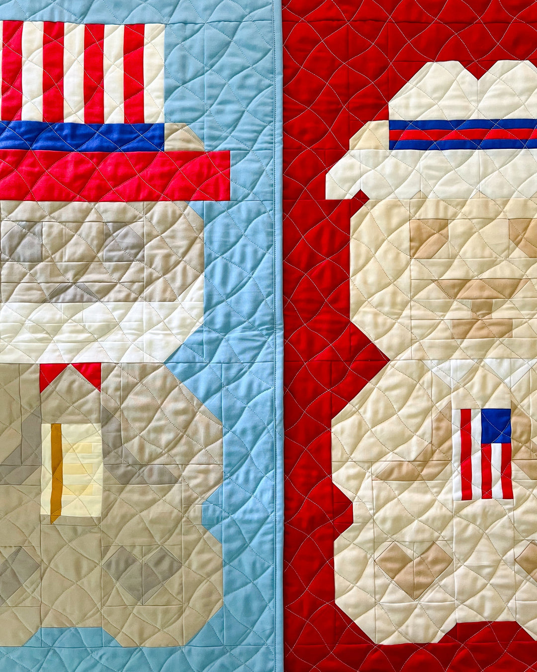 A pair of Independence Day themed bear quilts