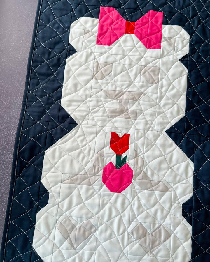Miss Beary Rosey Quilt Block Pattern featuring a pink bow and red flower on a navy background