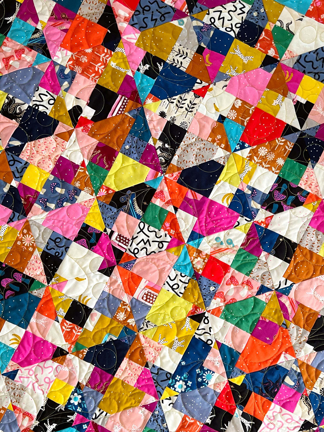 Utter Chaos Quilt closeup detail of quilting and blocks